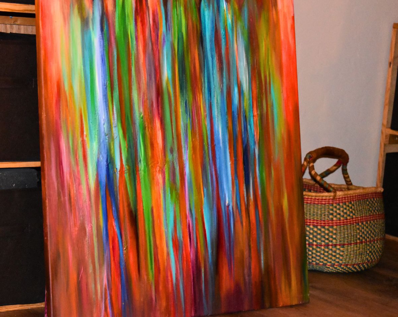 Finished acrylic canvas on an easel in the Creative Sage studio